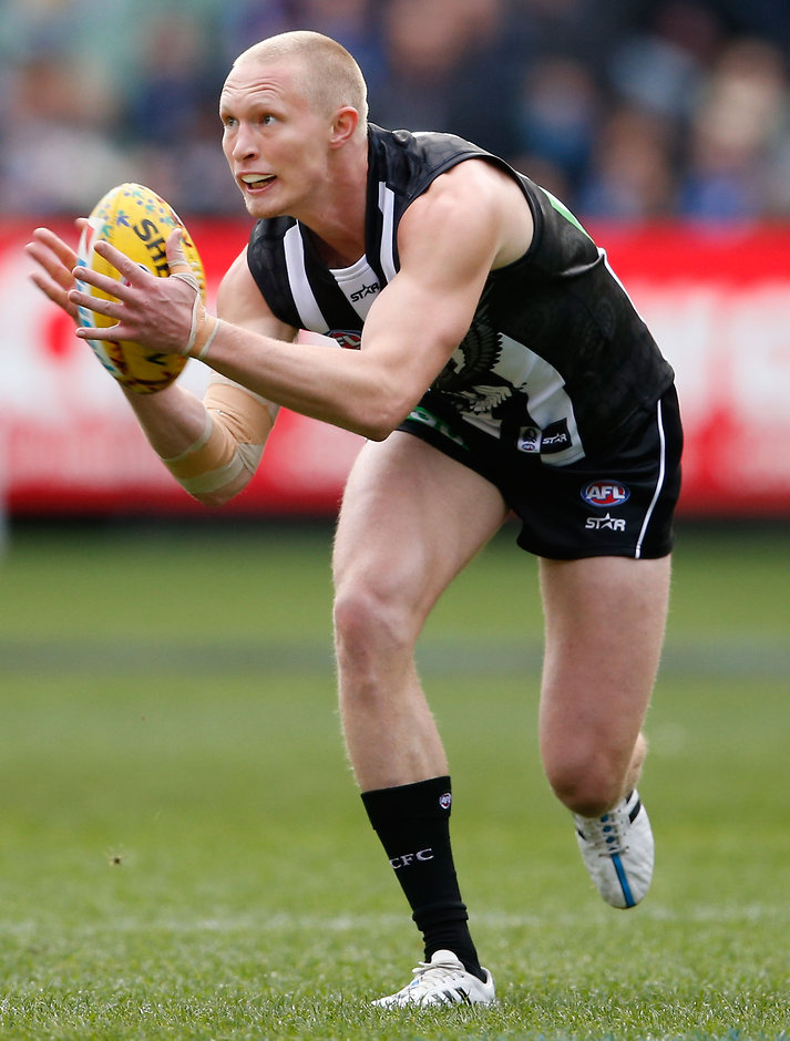 AFL 2016 Rd 10 - Collingwood v Western Bulldogs MELBOURNE, AUSTRALIA - MAY 29: Jack Frost of the Magpies marks the ball during the 2016 AFL Round 10 match between the Collingwood Magpies and the Western Bulldogs at the Melbourne Cricket Ground on May 29, 2016 in Melbourne, Australia. (Photo by Adam Trafford/AFL Media)